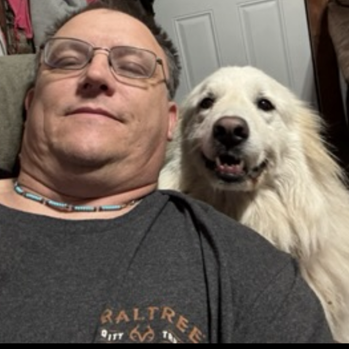 Elvis Ray Phillips Sr with Goosey the Great Pyrenees